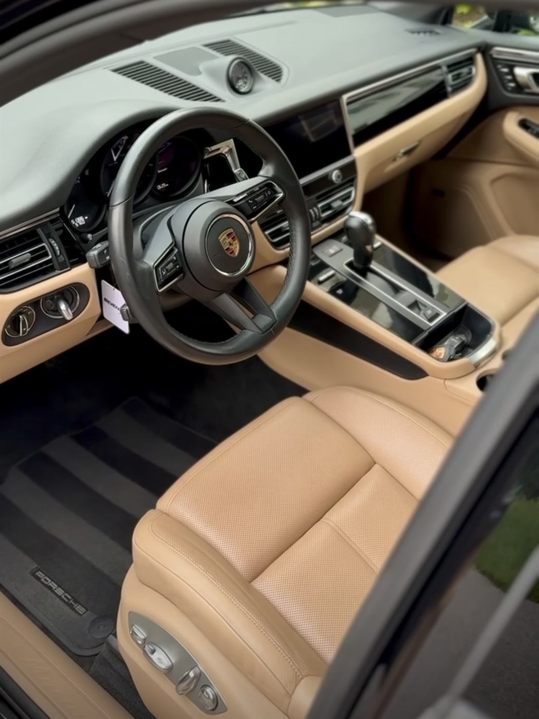 Detailed tan leather interior and dashboard