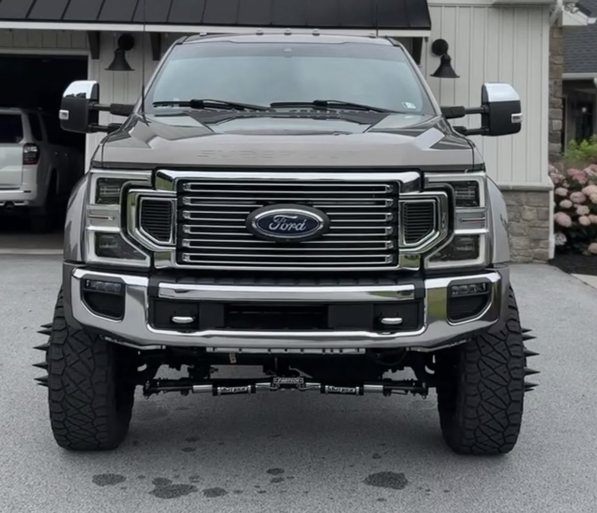 Detailed lifted Ford Super Duty truck, front view